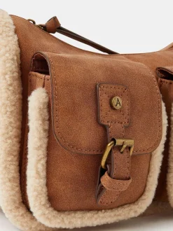 Accessorize Sac à bandoulière à poche en faux shearling