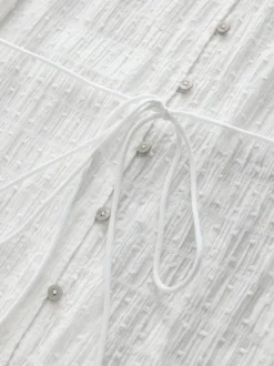 Blanc - Robe longue sans manches boutonnée ceinturée