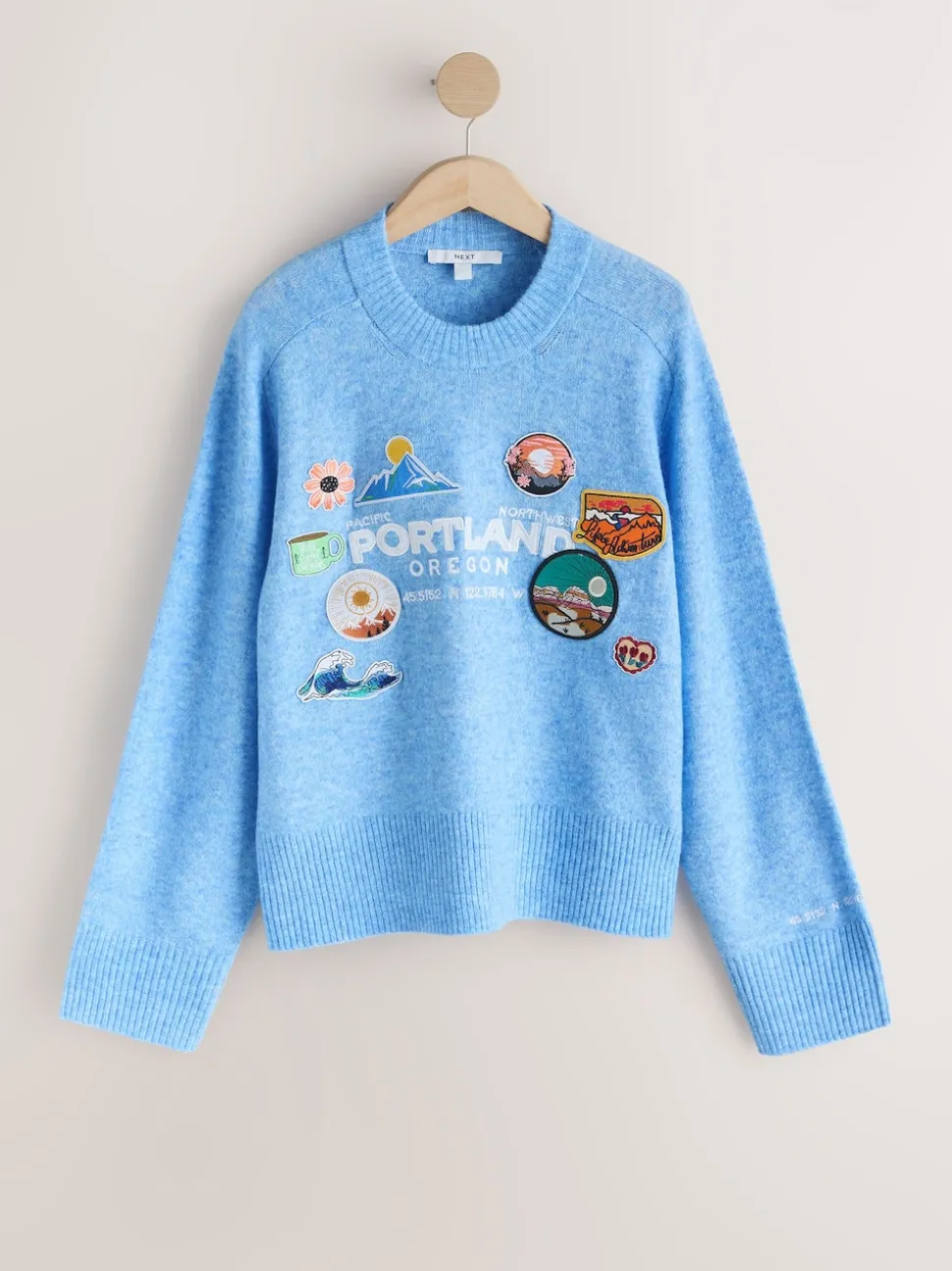 Broderie avec écusson bleu clair - Pull en maille à col rond en laine