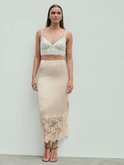 Champagne doré - Jupe mi-longue en satin bordée de dentelle