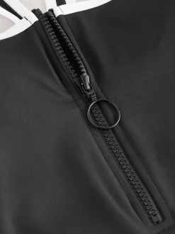 Contraste noir/blanc - Maillot de bain avec fermeture éclair et contrôle du ventre