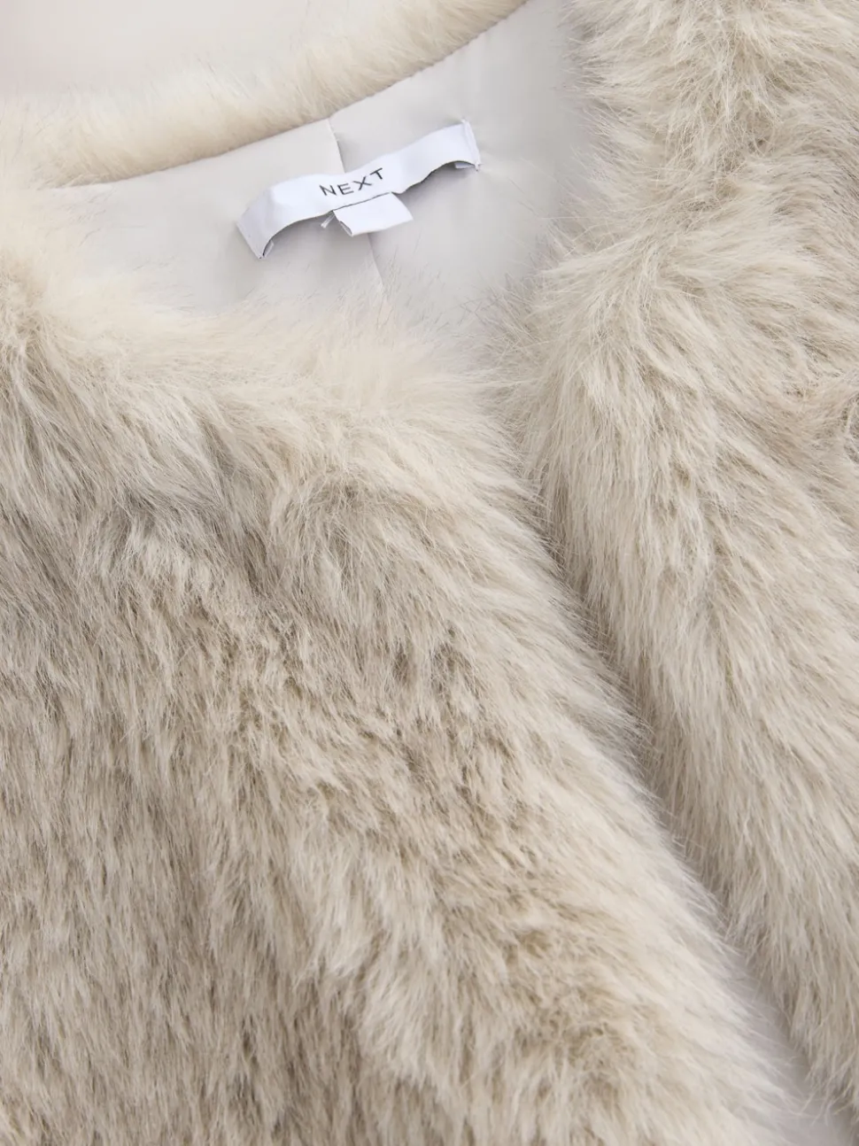 Crème - Veste sans manches en fausse fourrure