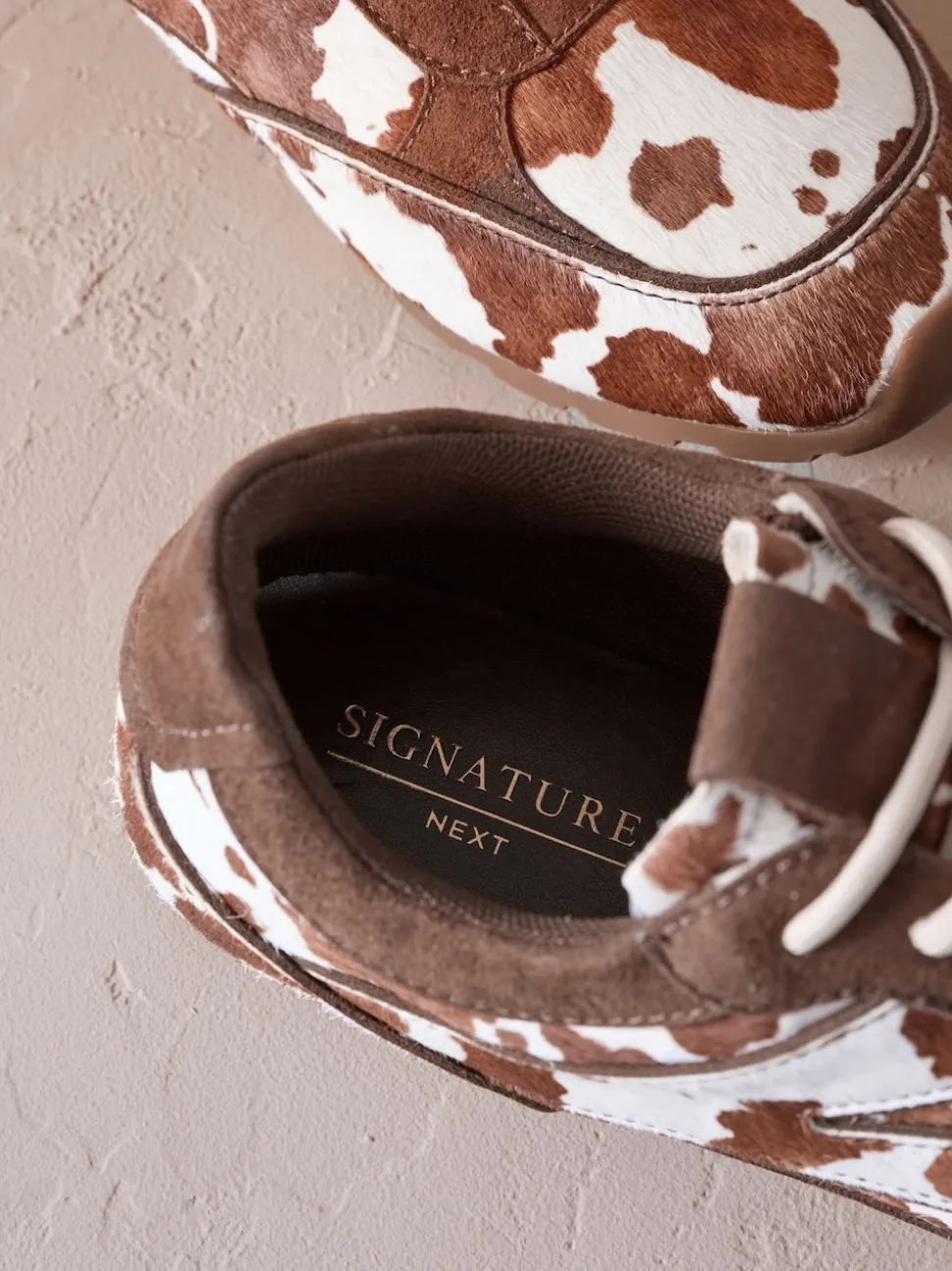Imprimé vache - Baskets slim en cuir haut de gamme à lacets