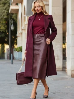 Jupe mi-longue Sosandar crayon en cuir à empiècements
