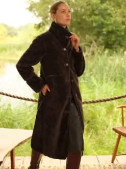 Manteau Love & Roses mi-long en shearling à liserés