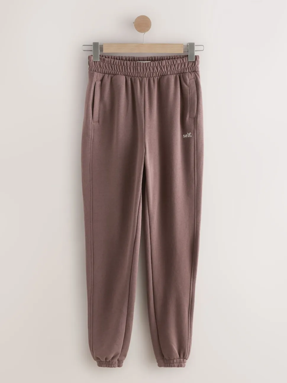 Marron - soi-même. Jogging à poignets