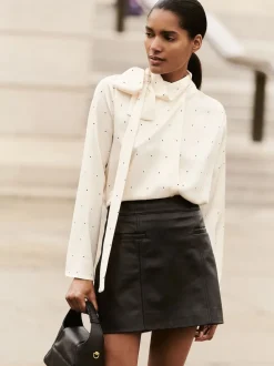 Minijupe Reiss Seema avec poche passepoilée en cuir