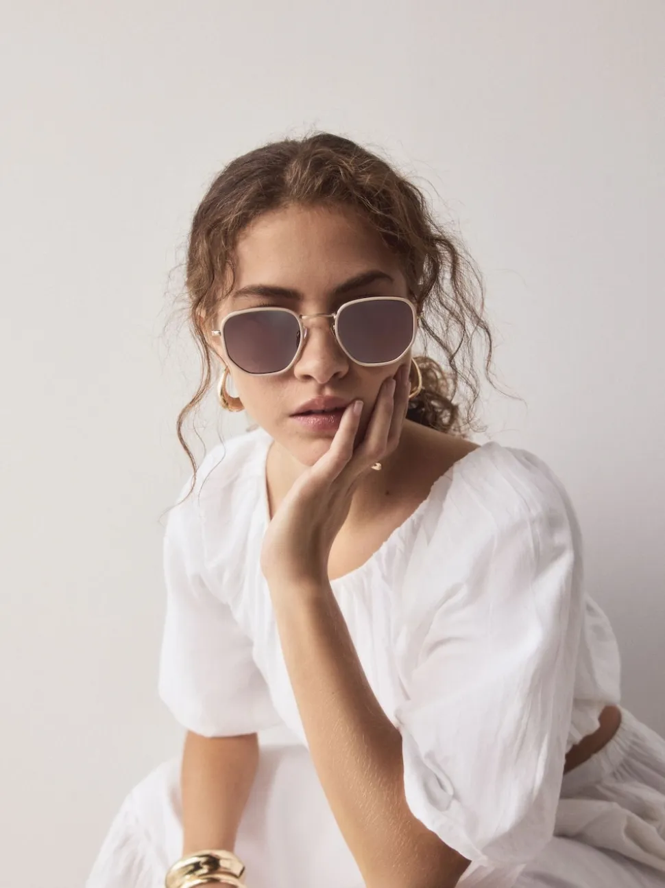 os - Lunettes de soleil rondes en métal