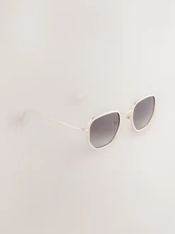 os - Lunettes de soleil rondes en métal