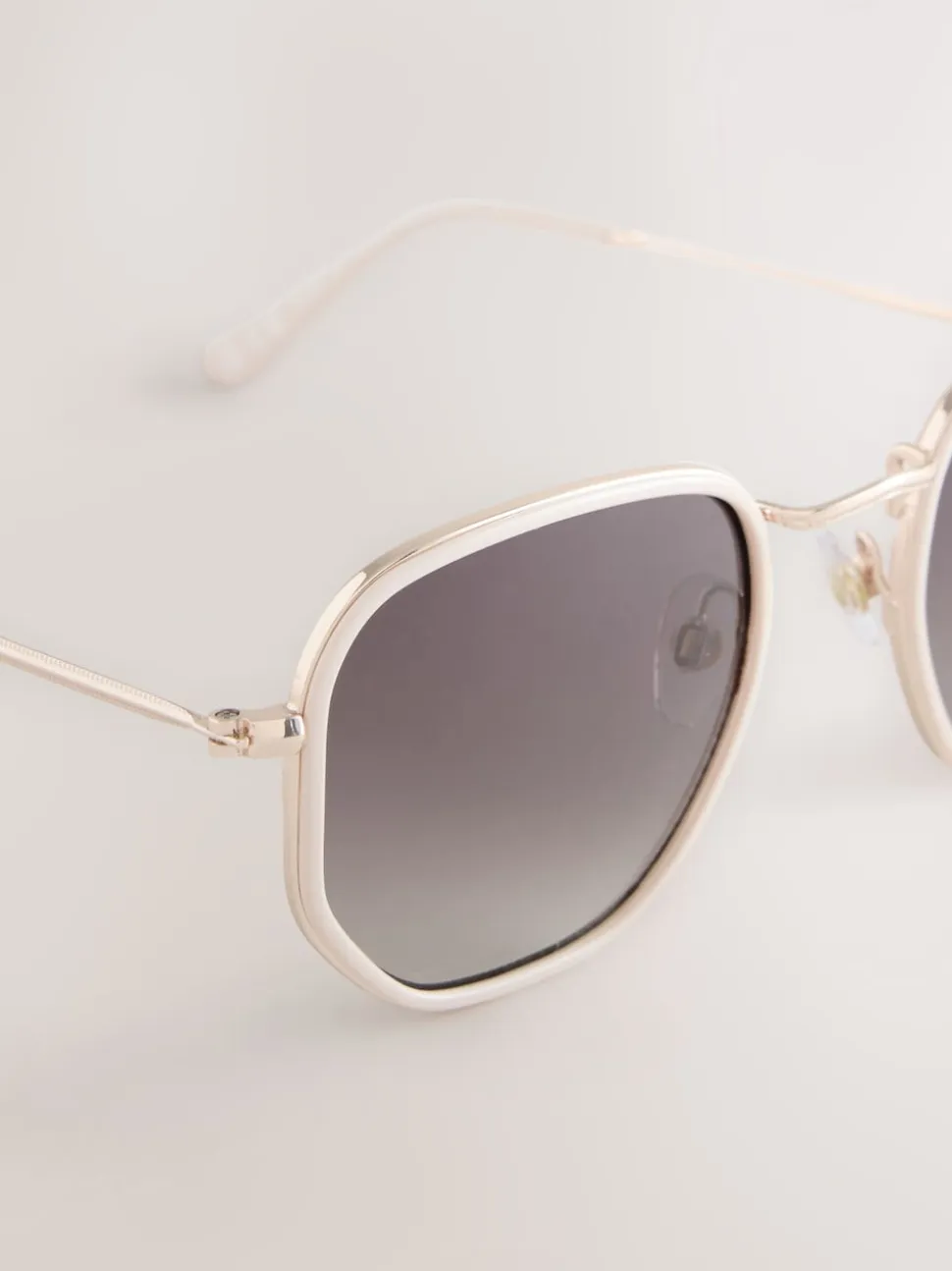 os - Lunettes de soleil rondes en métal