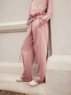 Rose - soi-même. Pantalon de jogging coupe large
