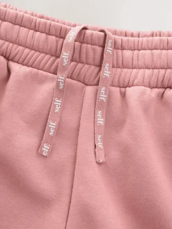Rose - soi-même. Pantalon de jogging coupe large