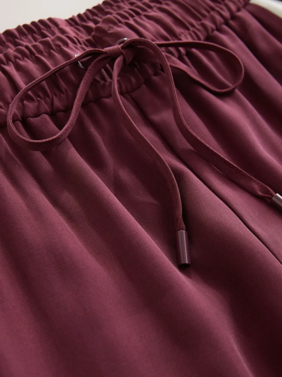 Rouge bordeaux - Pantalon large à bande latérale