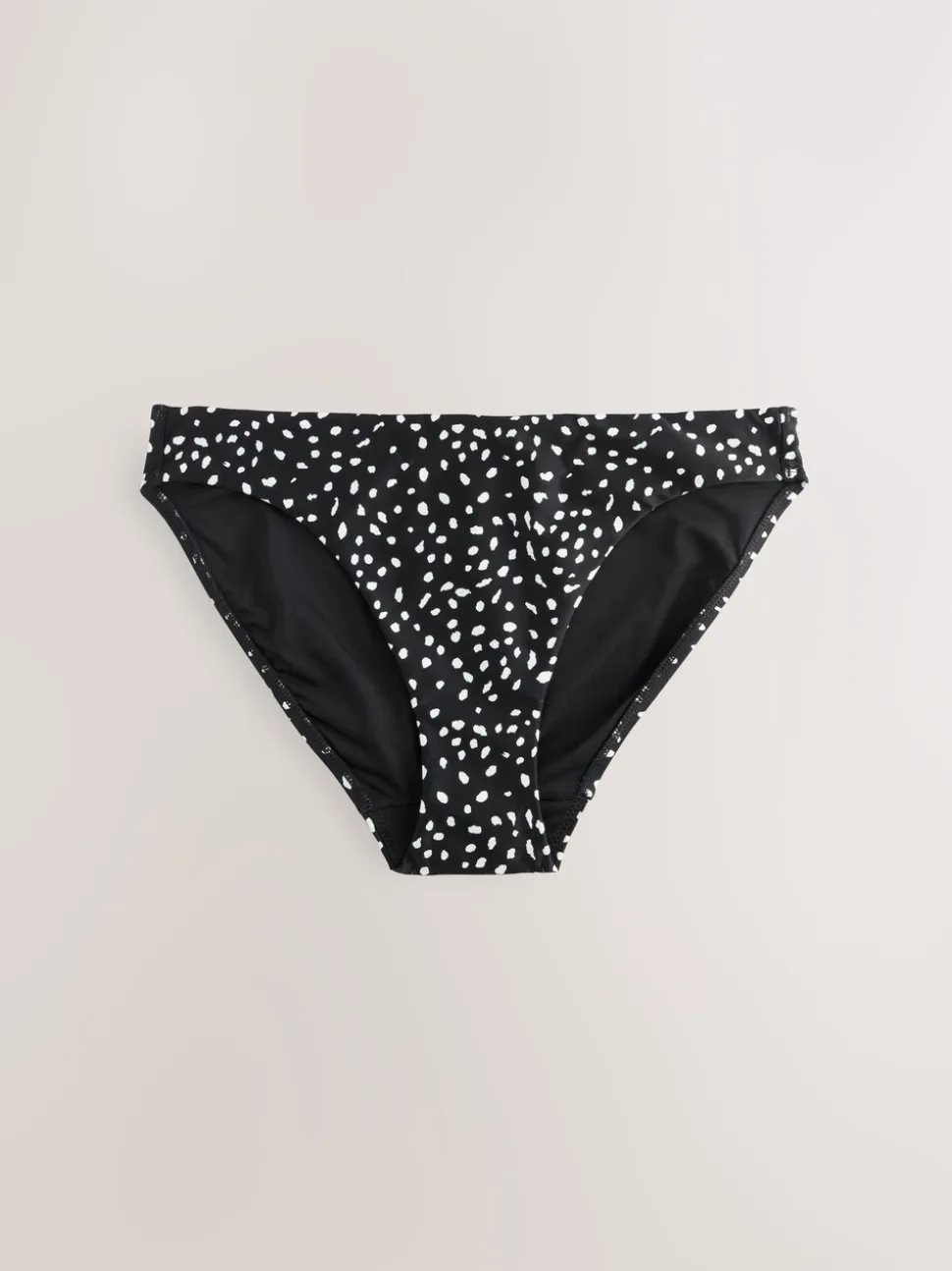 Tache noire/blanche - Bas de bikini échancré
