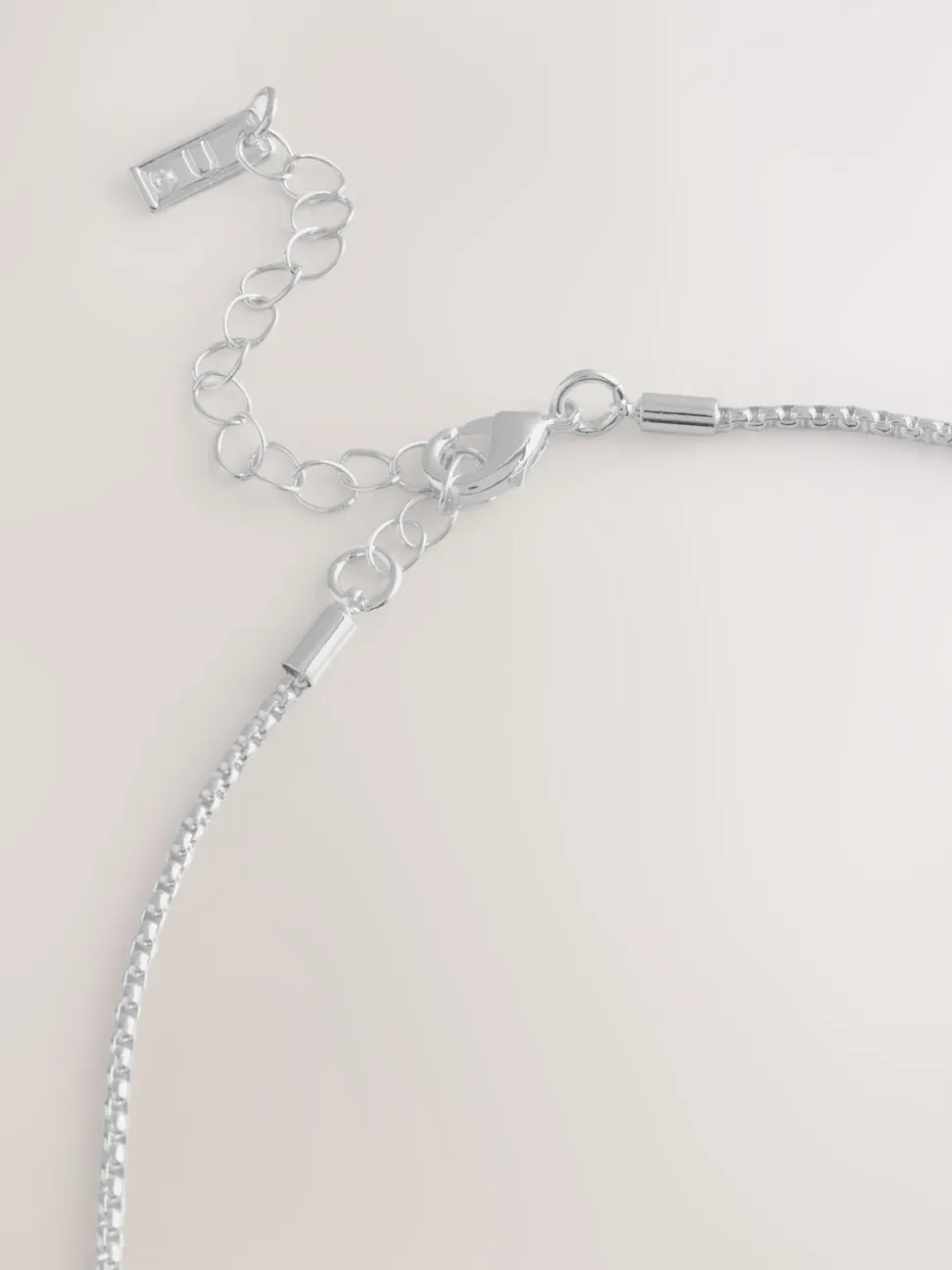 Tonalité argentée - Collier long avec pendentif