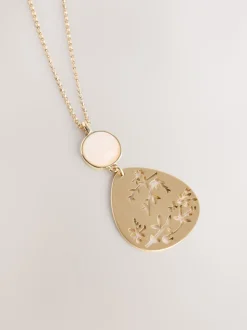 Tonalité d'or - Collier avec pendentif détail fleuri