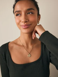 Tonalité d'or - Collier en acier inoxydable motif zodiaque