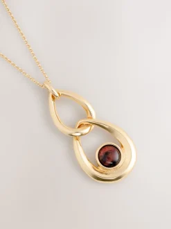 Tonalité d'or - Collier entrelacé avec pierres entrelacées