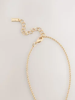 Tonalité d'or - Collier entrelacé avec pierres entrelacées