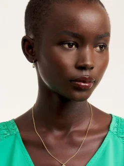 Tonalité d'or - Ted Baker SININAA : Collier avec pendentif en cristal