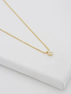 Tonalité d'or - Ted Baker SININAA : Collier avec pendentif en cristal