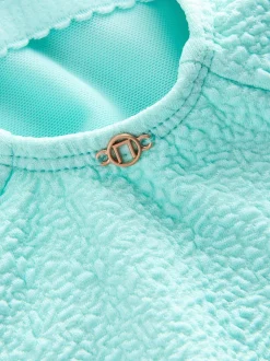 Vert menthe texturé - Maillot de bain gainant le ventre froncé